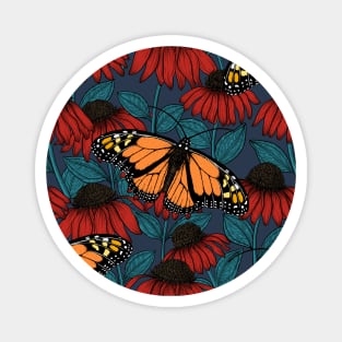 Monarch butterfly on red coneflowers Magnet